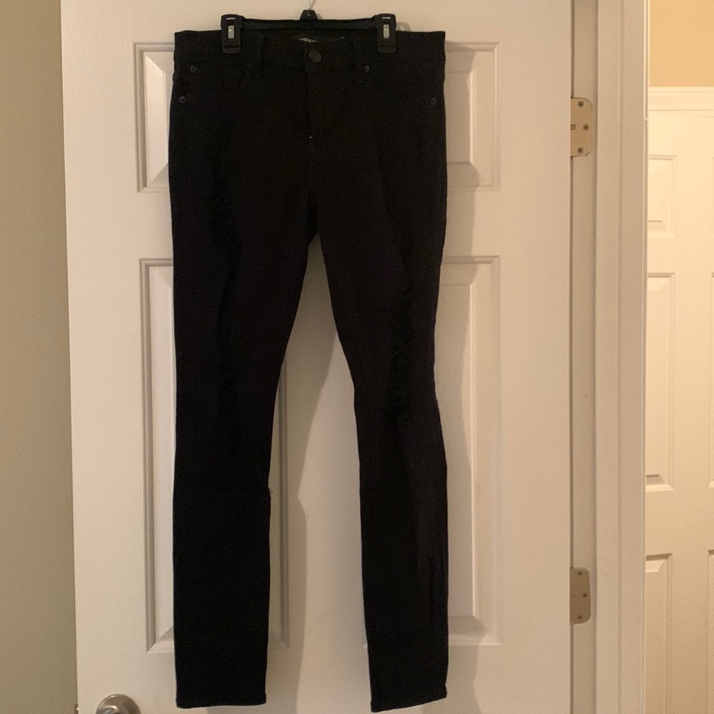 Express distressed black jean leggings.